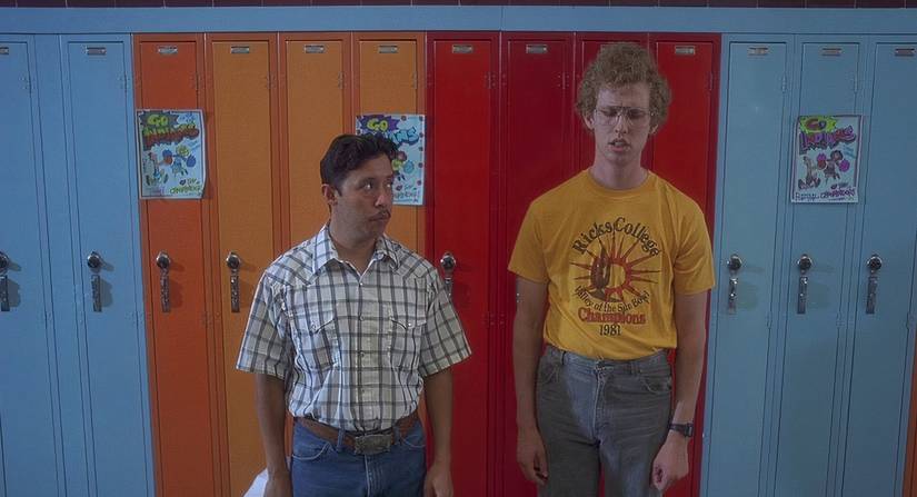 Napoleon Dynamite standing next to some lockers in the film of the same name.