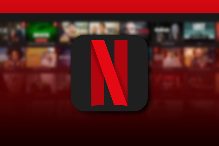Netflix logo centered on a dark gradient background, with a blurred grid of shows and movies behind it.