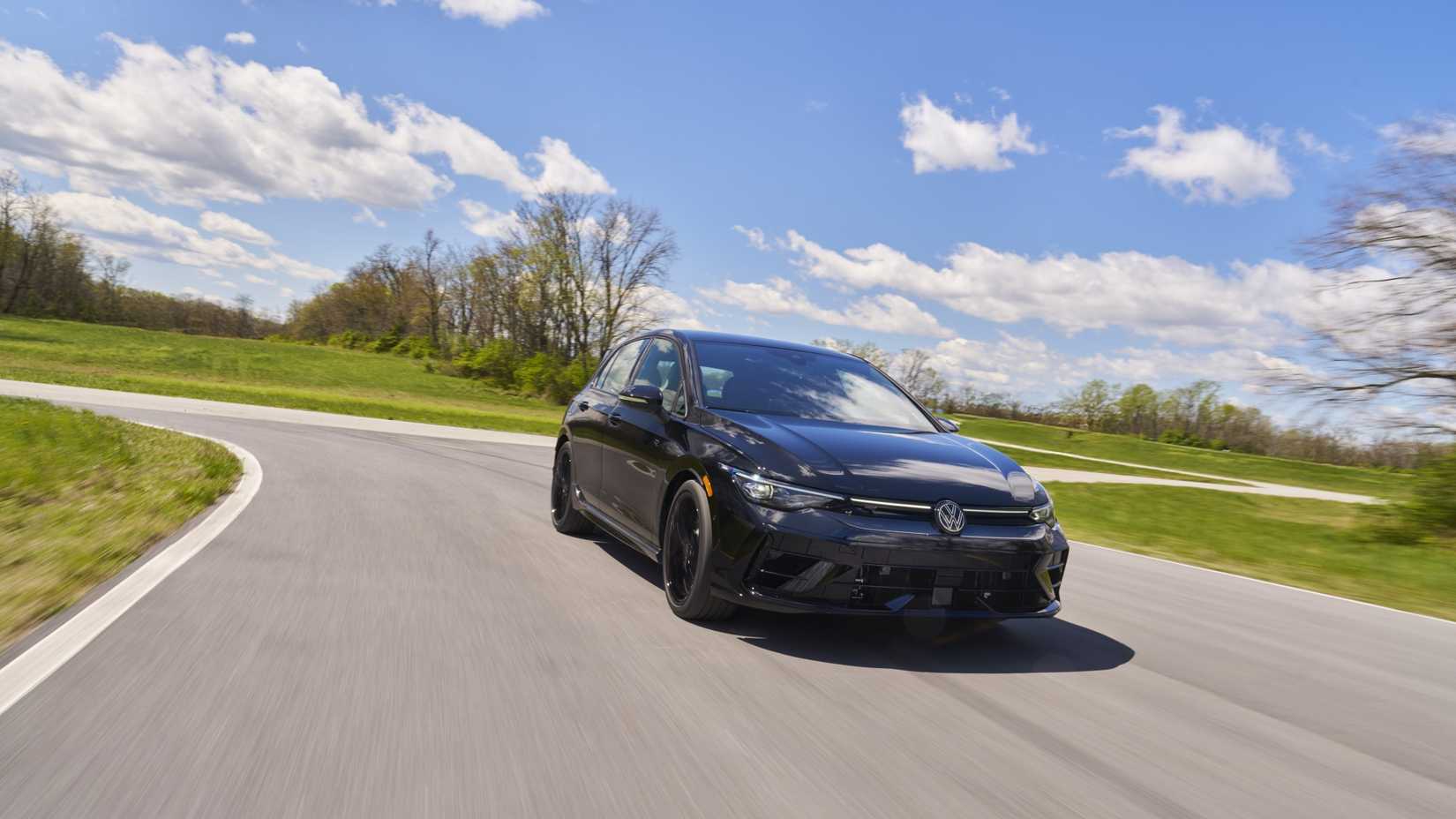 Front 3/4 action shot of a 2025 Volkswagen Golf R
