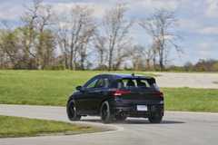 Rear 3/4 action shot of a 2025 Volkswagen Golf R