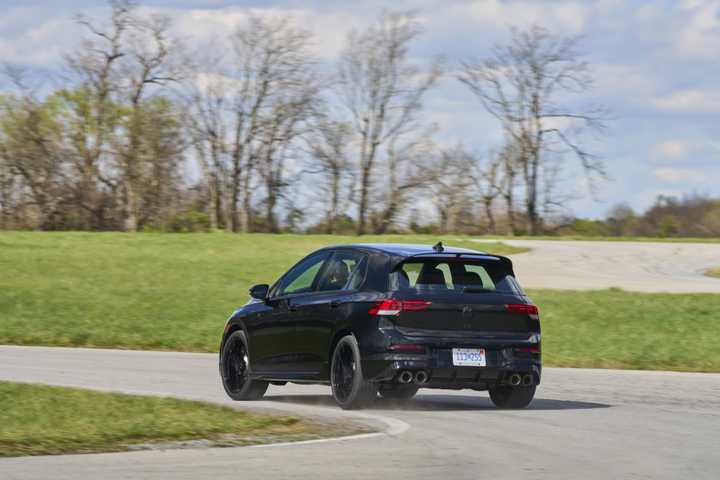 Rear 3/4 action shot of a 2025 Volkswagen Golf R