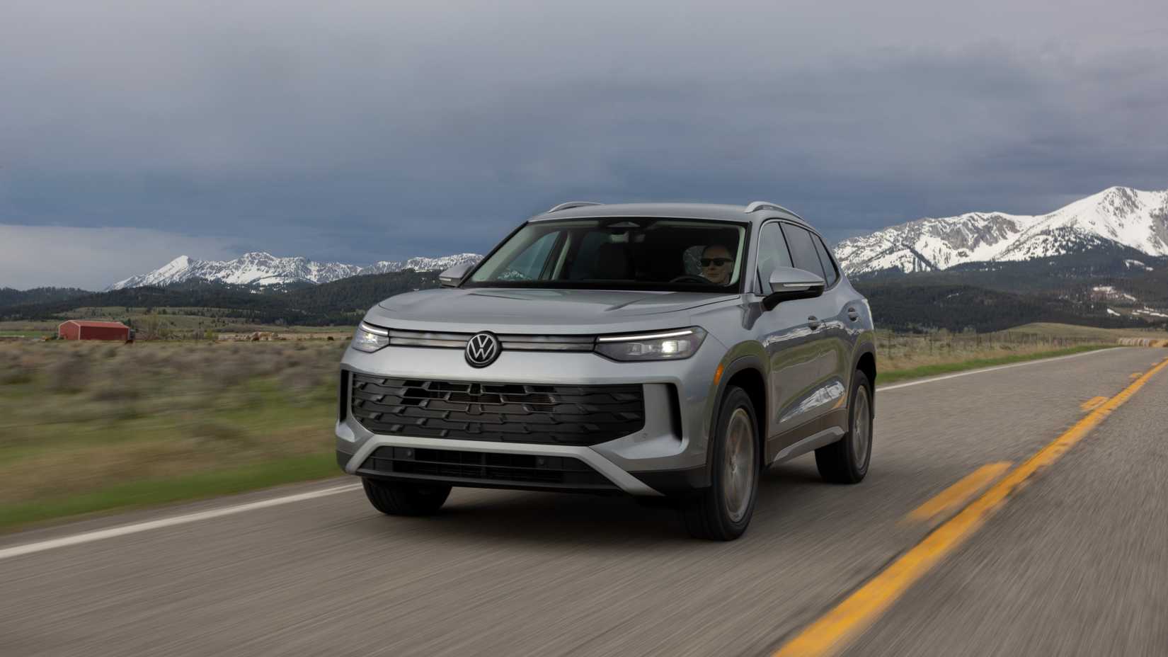 Front 3/4 action shot of a 2025 Volkswagen Tiguan