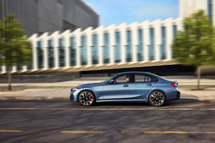 Side profile action shot of a 2025 BMW 3-Series 