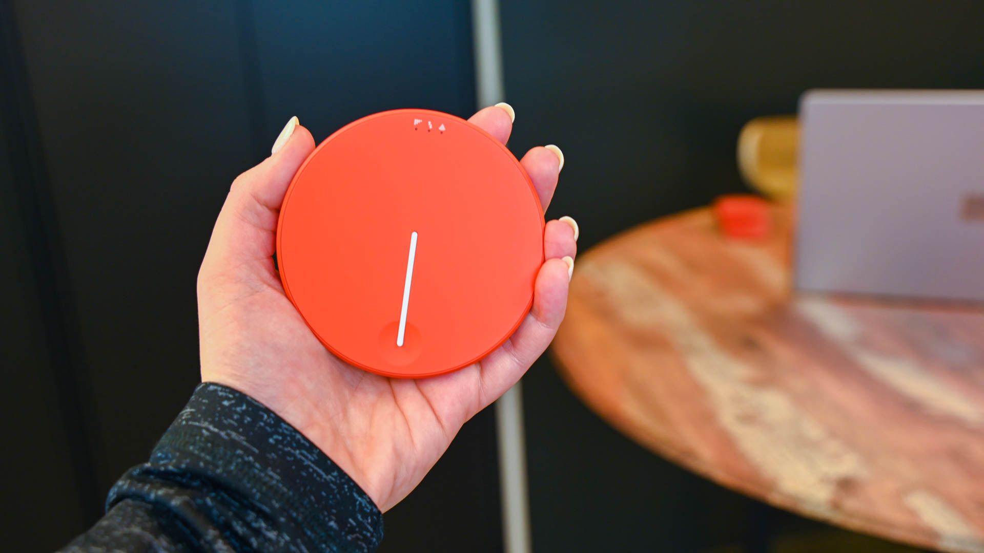 Person holding the Solis Lite Mobile Wifi Hotspot