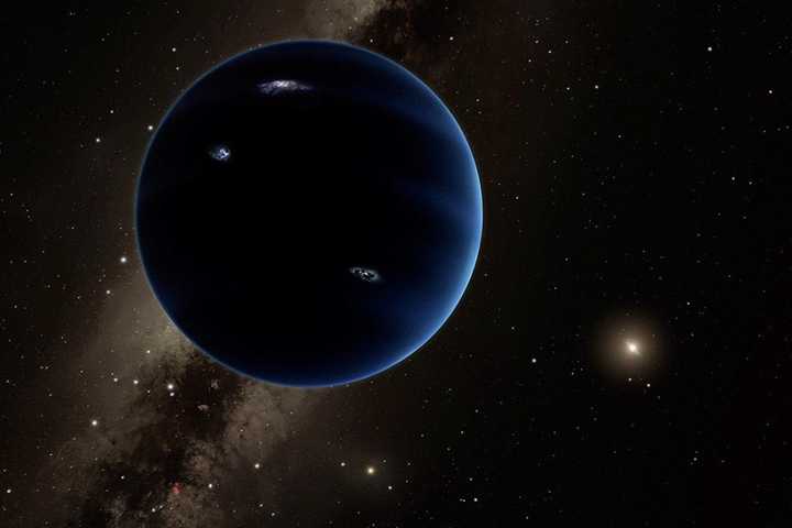 An artist's rendition of Planet Nine against a galactic backdrop. 