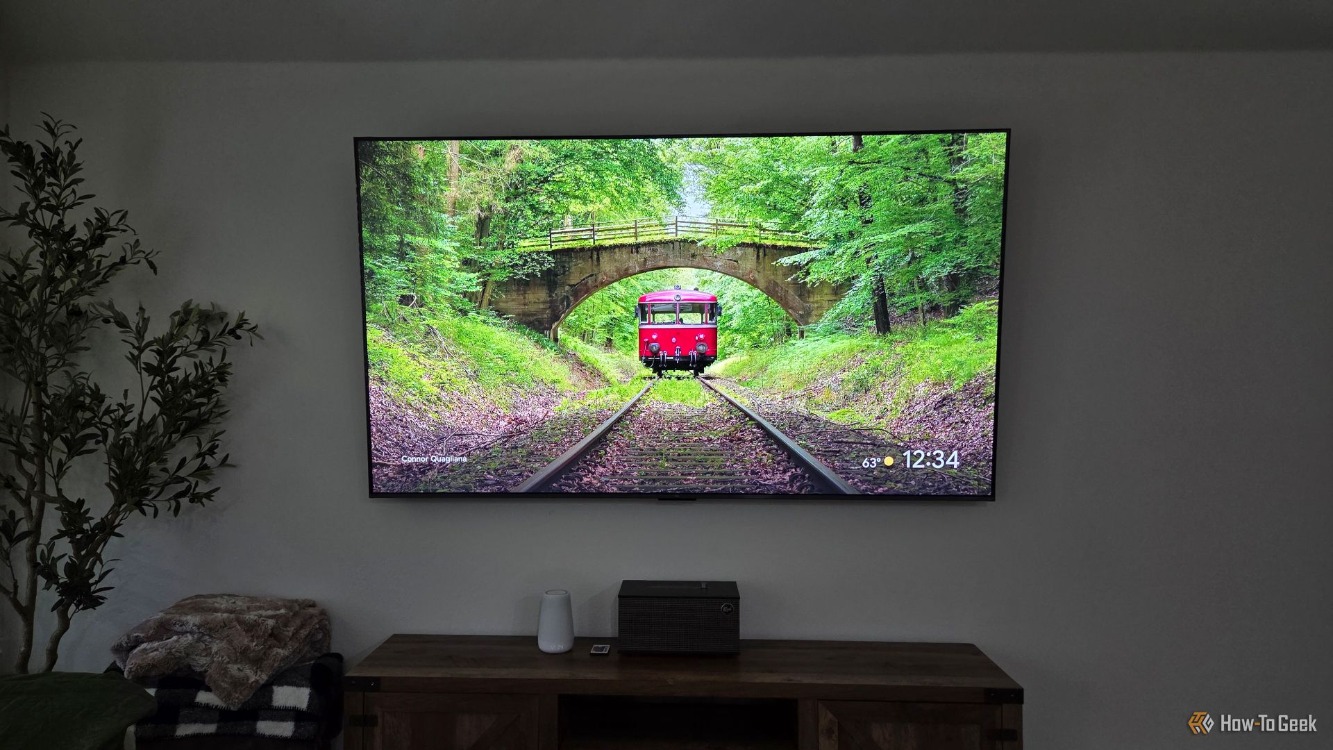 TCL QM6K on a wall.