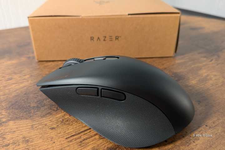 Razer Pro Click V2 and its box on a table.