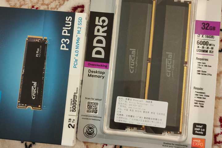 Crucial DDR5 RAM and an M.2 NVMe in their original packaging.