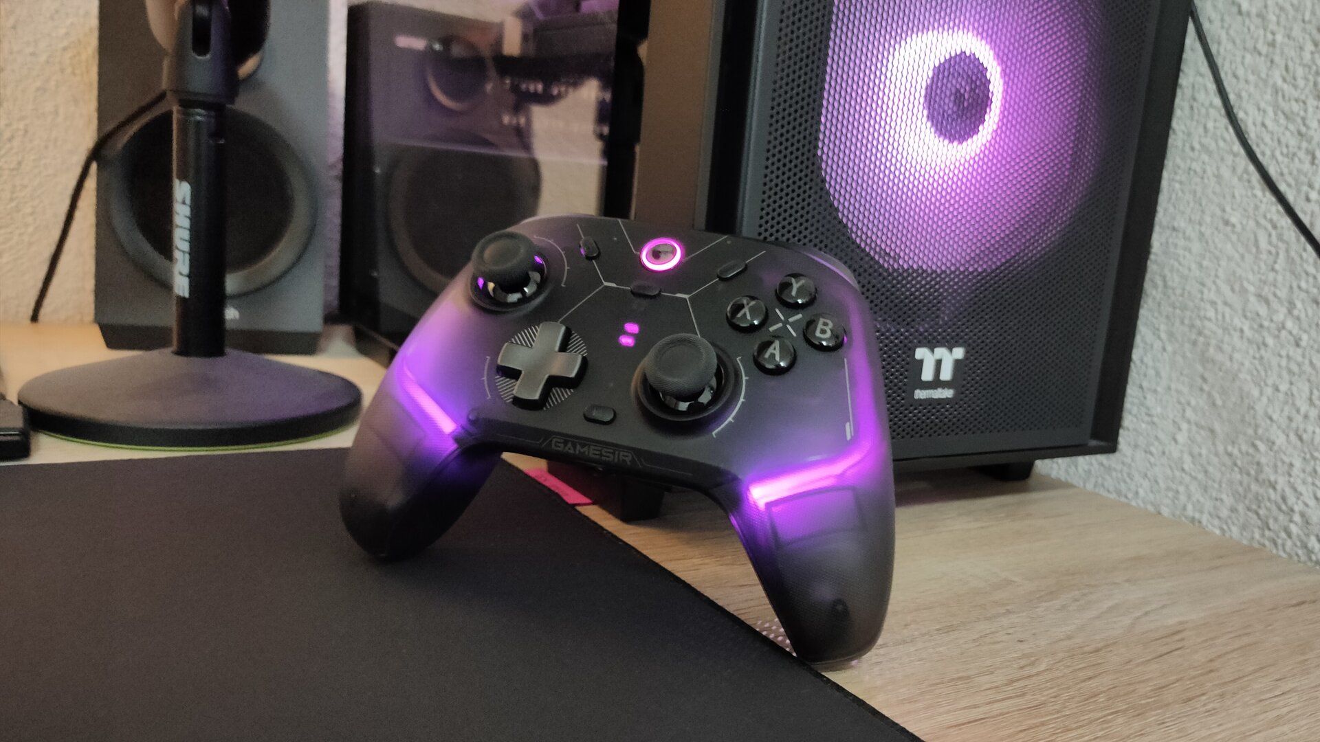 The GameSir Cyclone 2 controller next to a PC.