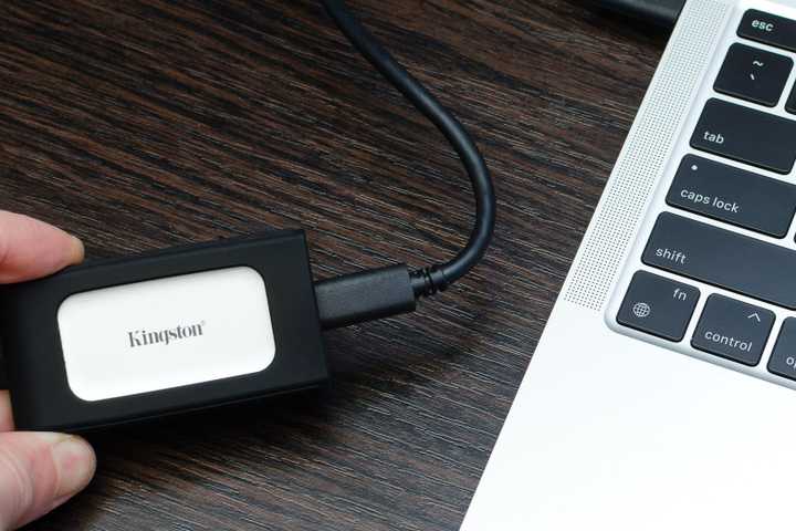 Kingston XS2000 SSD plugged into a MacBook.