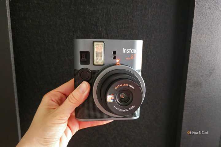 Someone holding the Fujifilm Instax Mini 41 instant camera.
