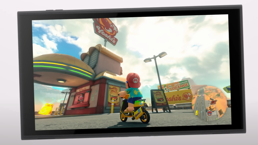 Switch 2 screen showing Mario on a scooter.