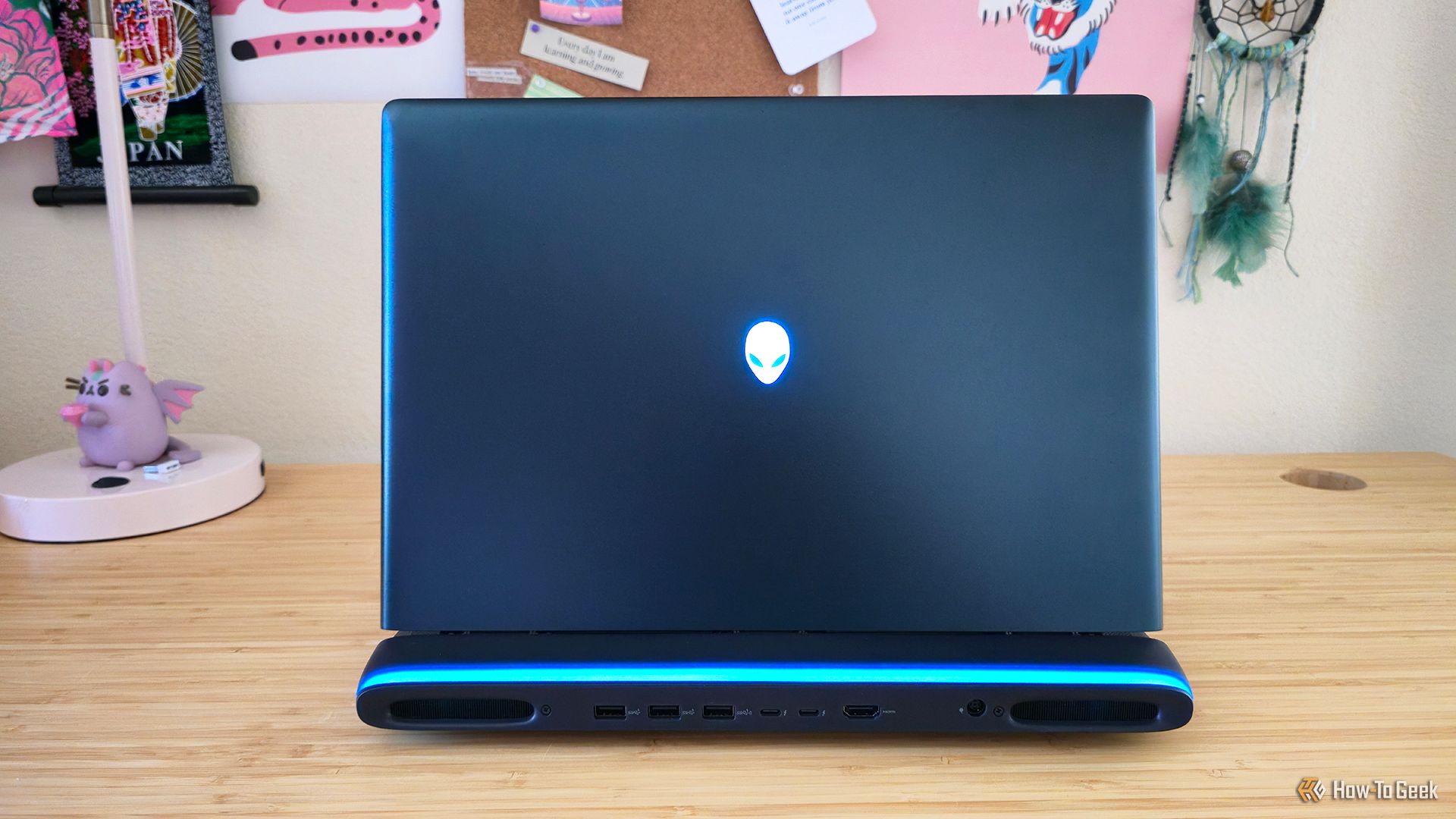 The back of the Alienware 16 Area-51 (2025) gaming laptop with the logo lit up.