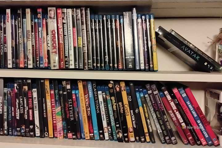 Two shelves of DVDs and Blu-rays, placed side by side.