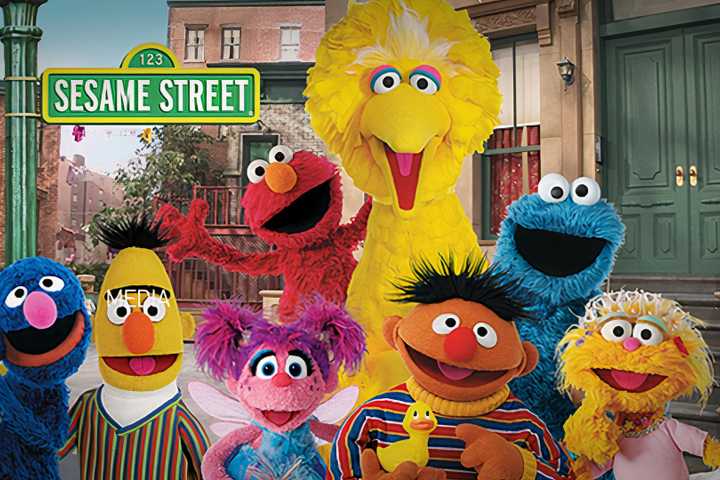 Various Muppets on Sesame Street with street sign in the background