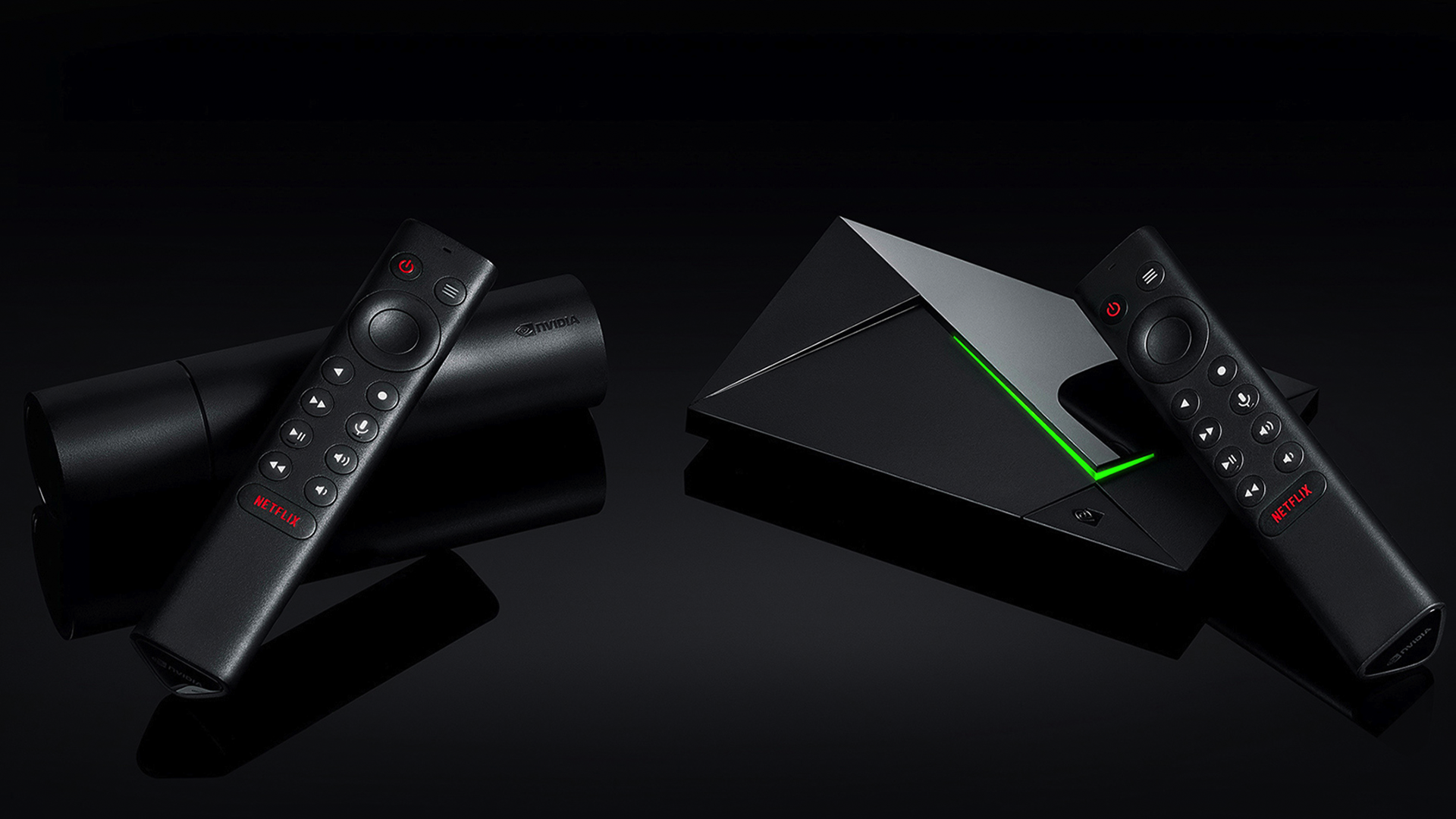 Two NVIDIA Shield TV devices on a black background.