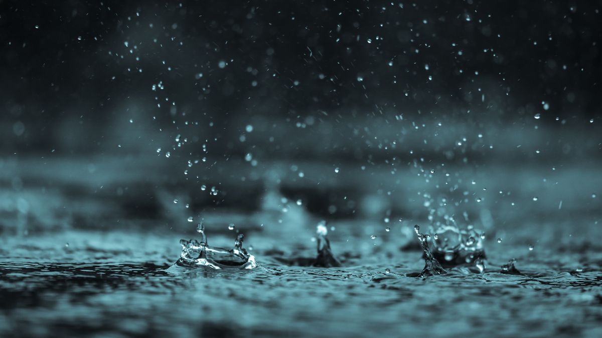 Rain falling and bouncing off a floor