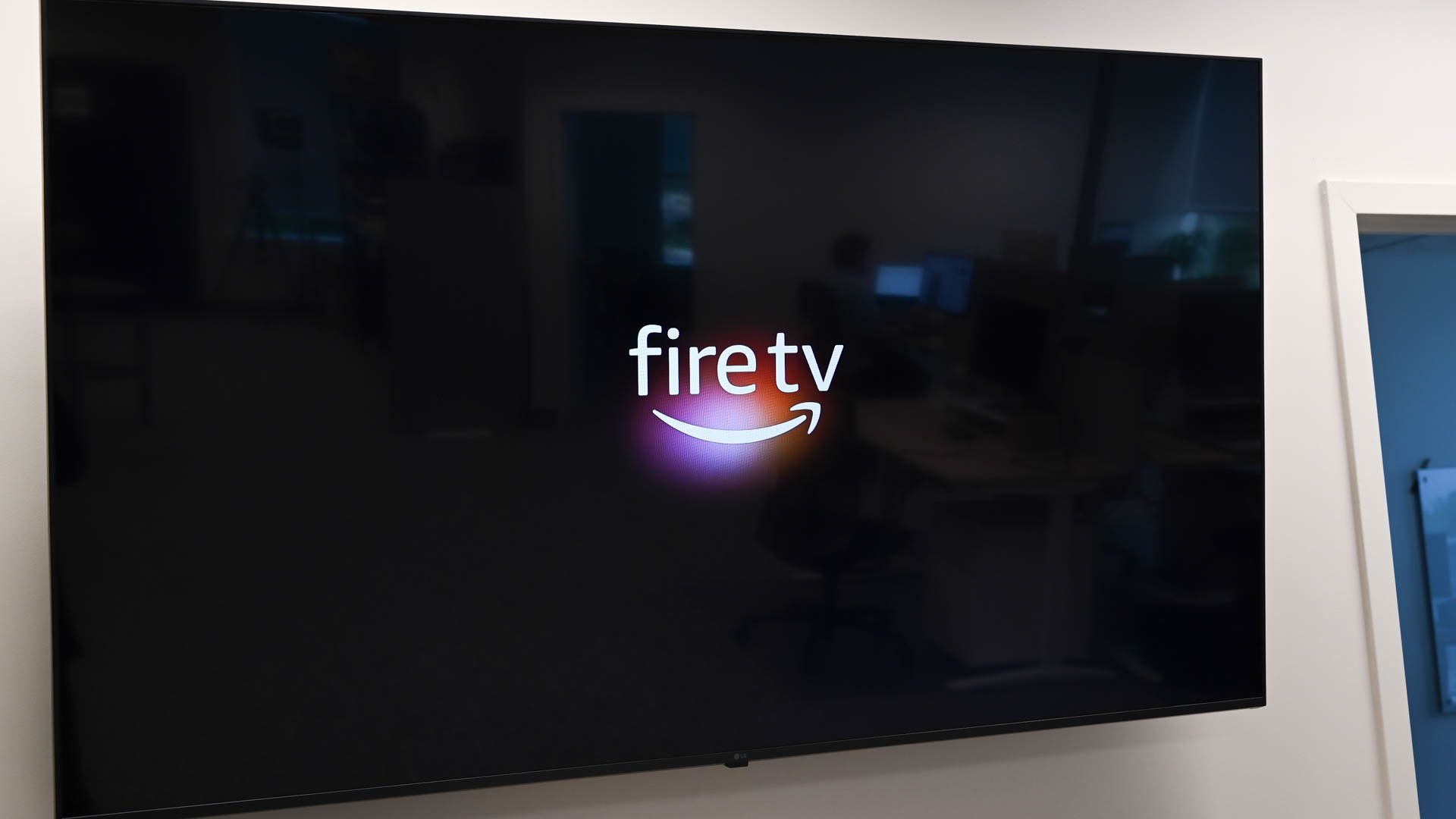 The Fire TV loading screen on a TV using an Amazon Fire Stick.