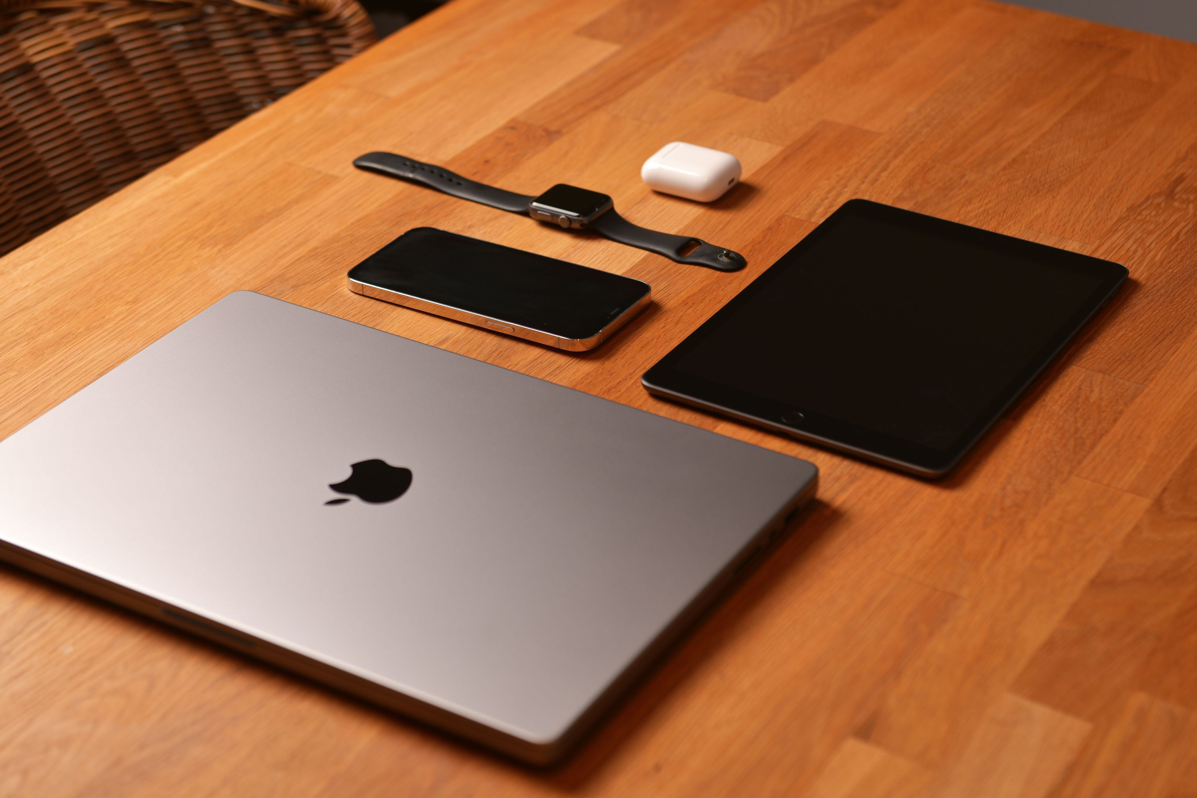 Various Apple products on a table.