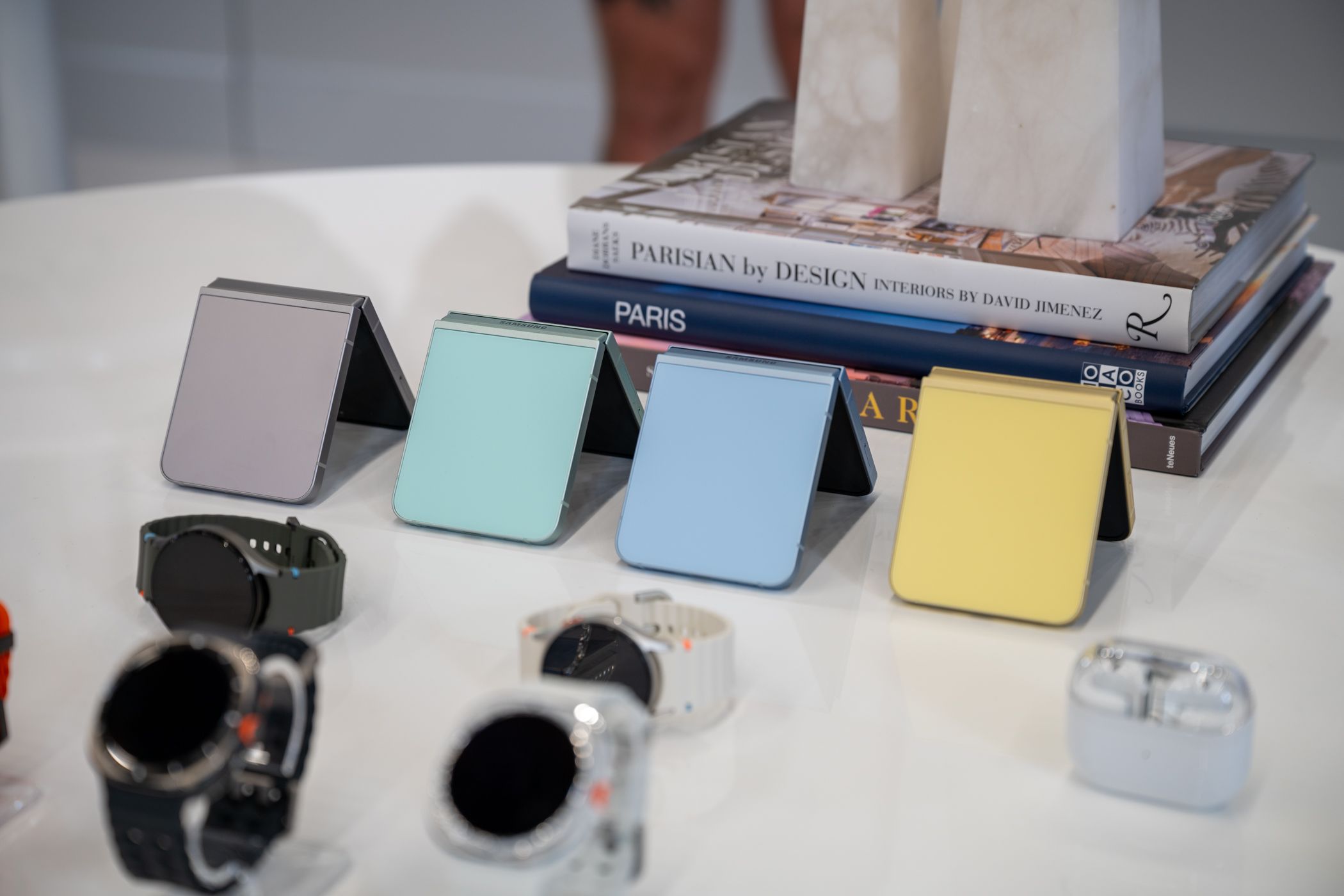 Samsung Galaxy Z Flip 6 in every color option sitting on a table.