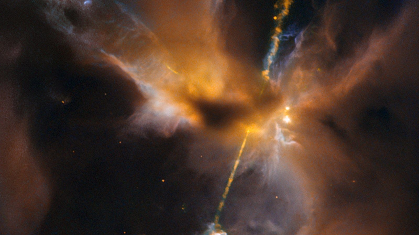 A Hubble photograph of a newborn star shooting twin jets out into space.