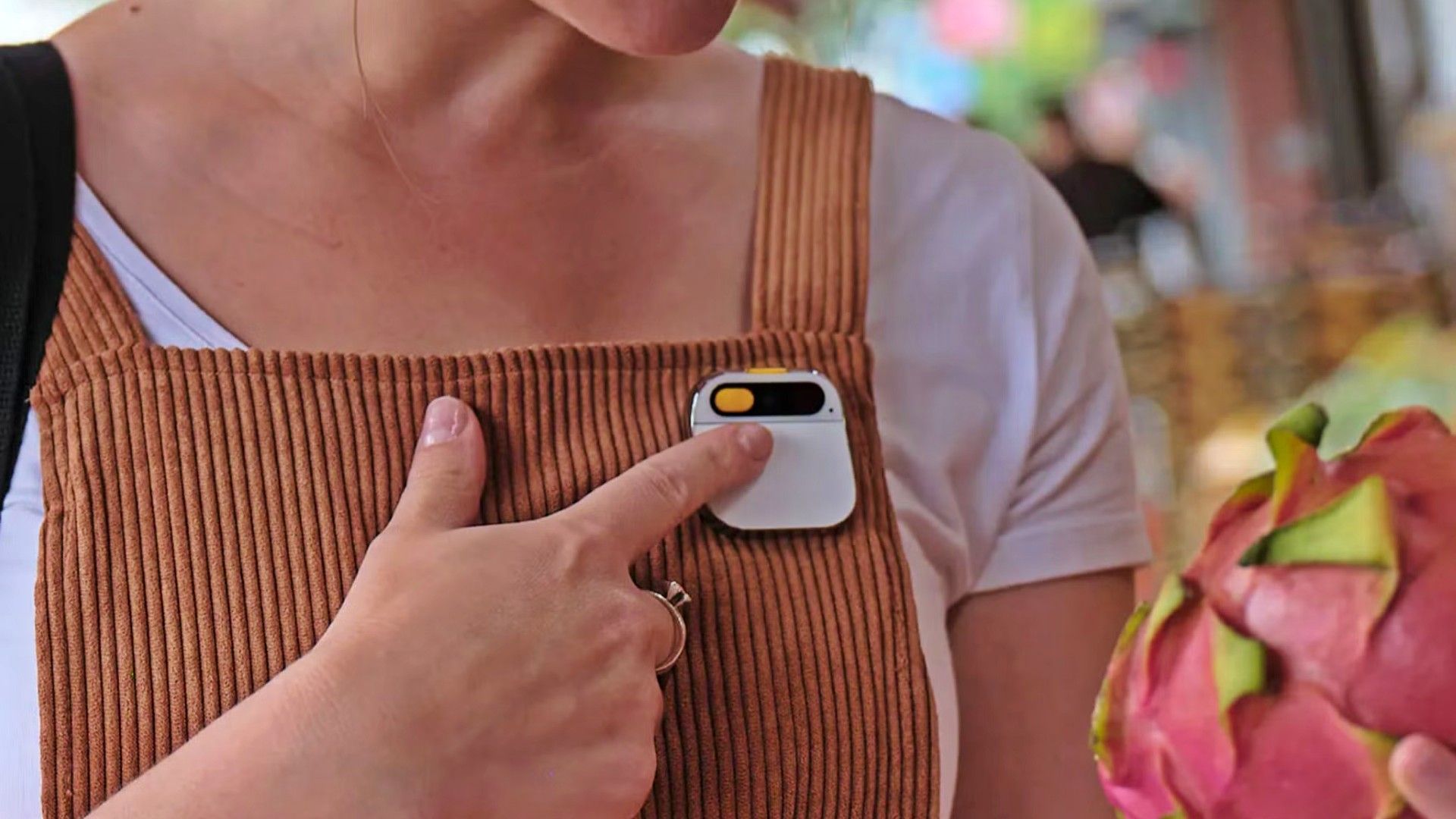 woman wearing humane ai pin.
