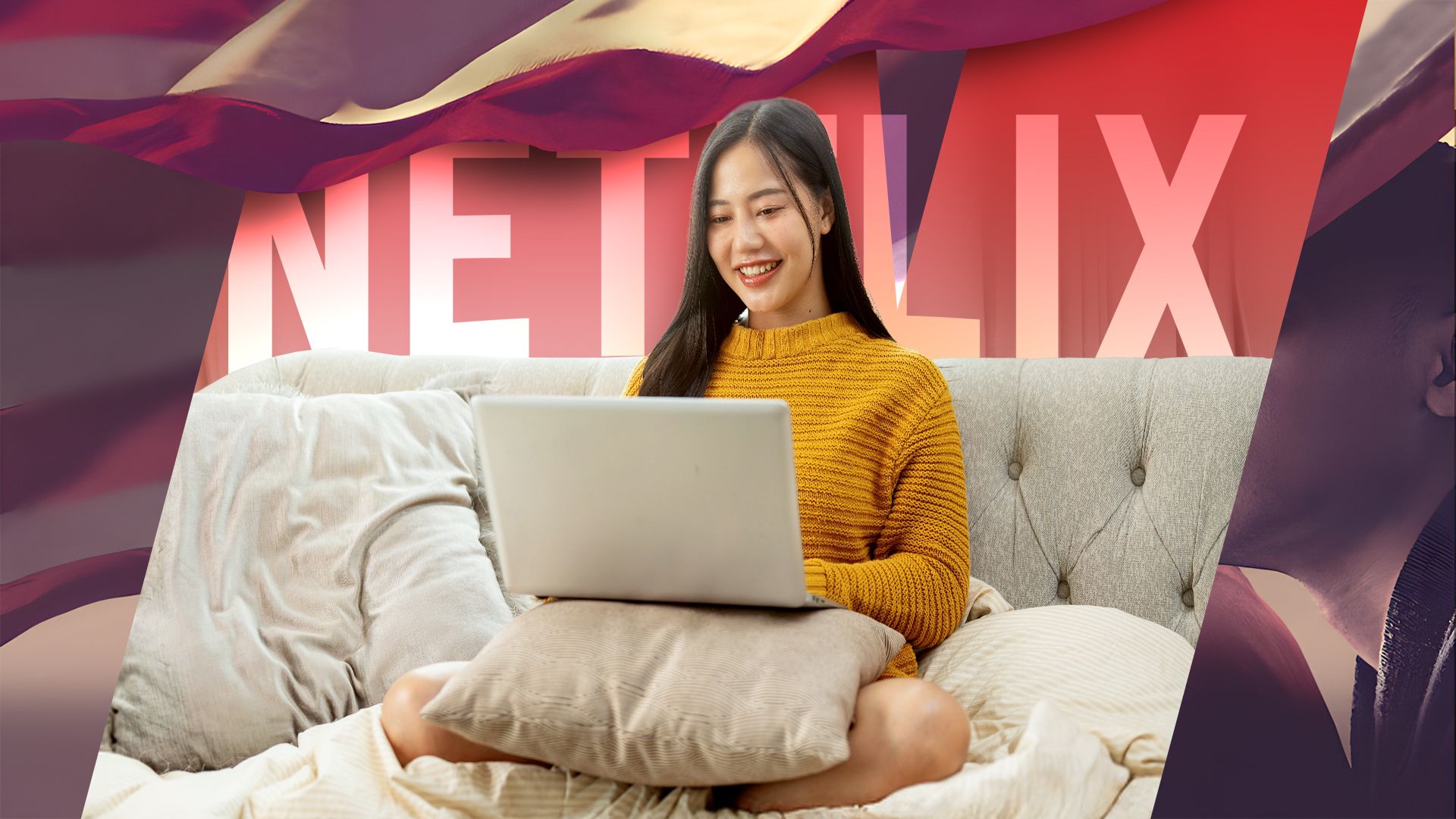 A happy woman sitting on the couch watching Netflix on her laptop.