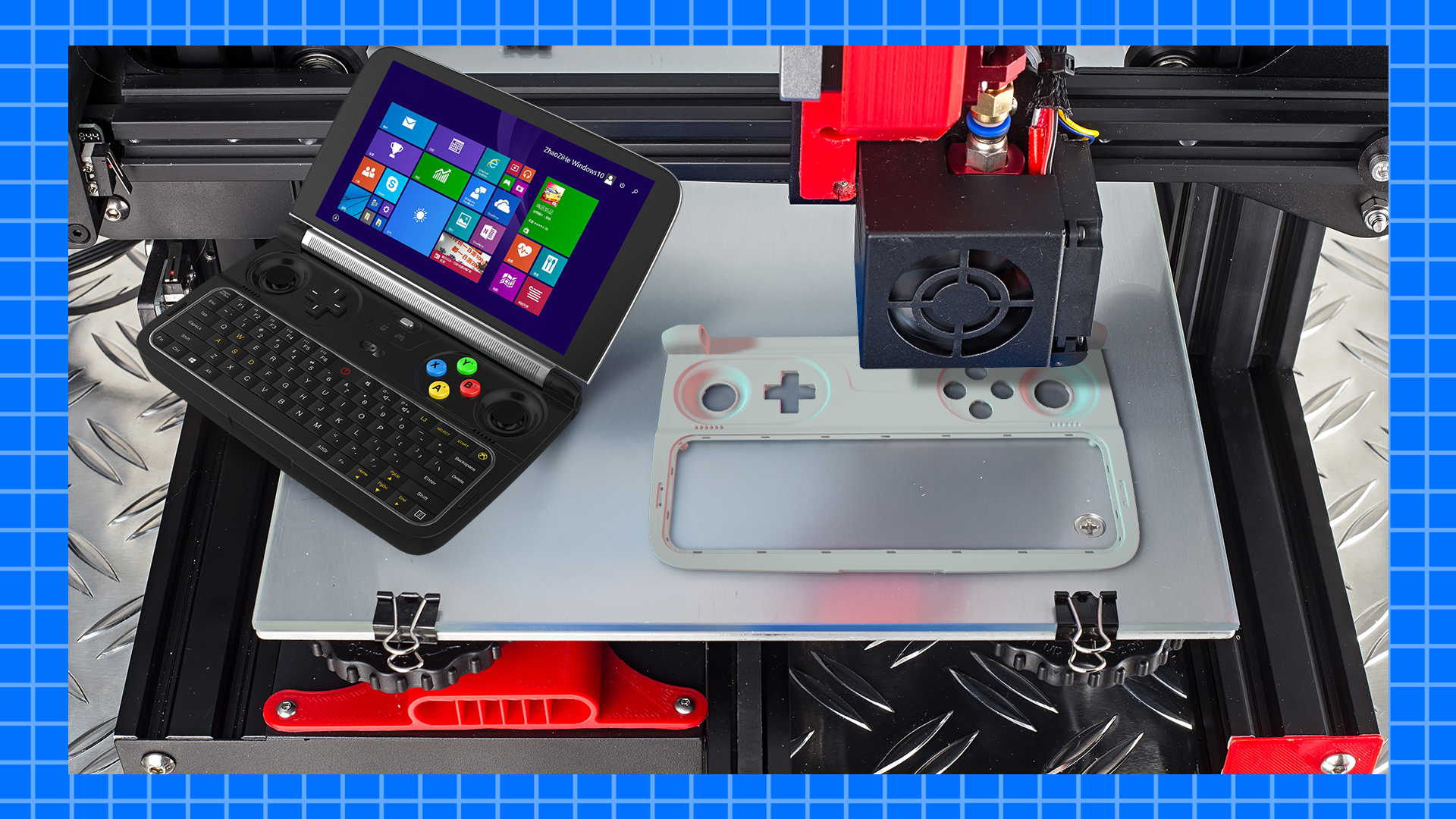 A Win 2 and a 3D printer printing a Win 2 case.