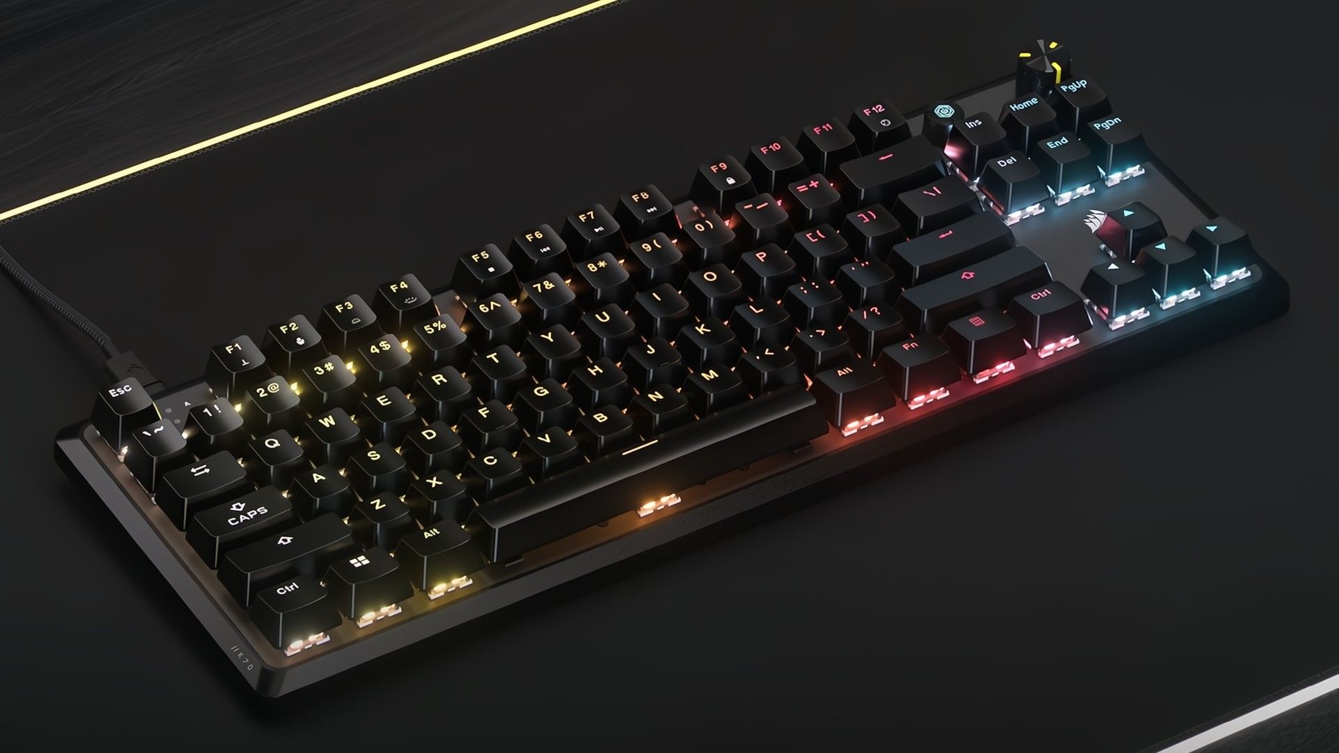 Corsair K70 CORE TKL RGB Tenkeyless Mechanical Wired Gaming Keyboard lit up on a desk