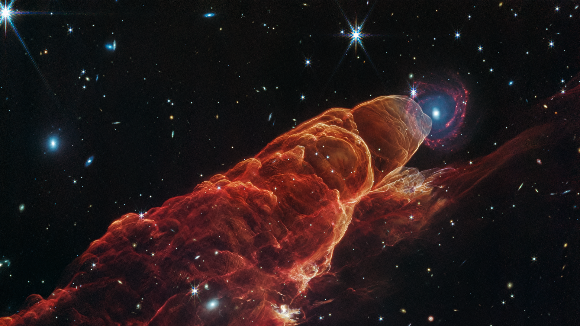 A newly formed star ejecting matter. 
