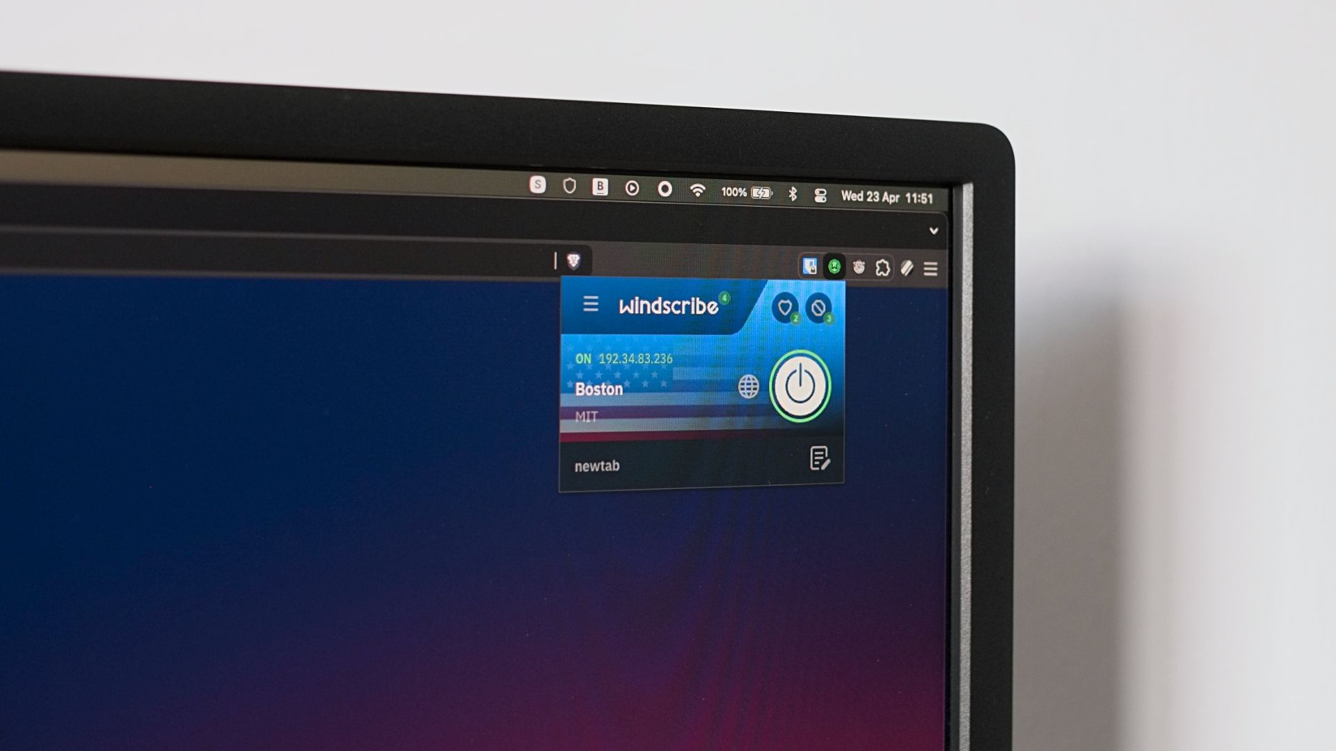 A computer display showing a VPN browser extension.