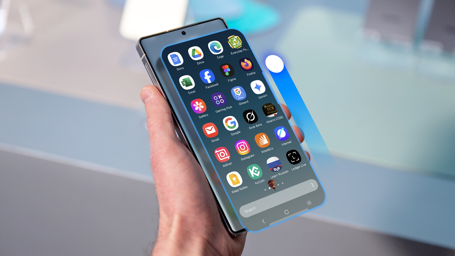 A hand holding an S25 Ultra with the app drawer open.