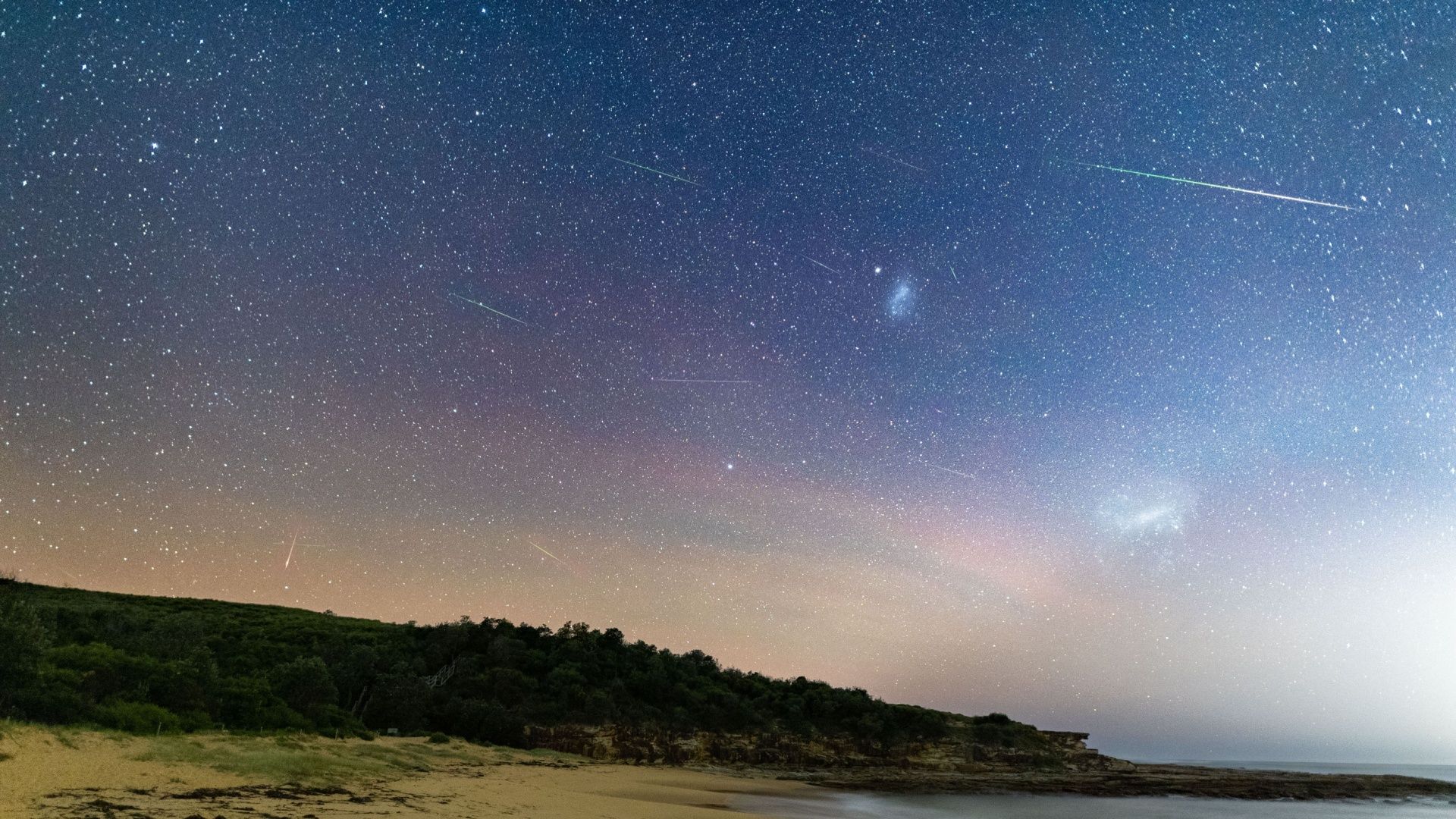 A long exposure photograph of a meteor shower.