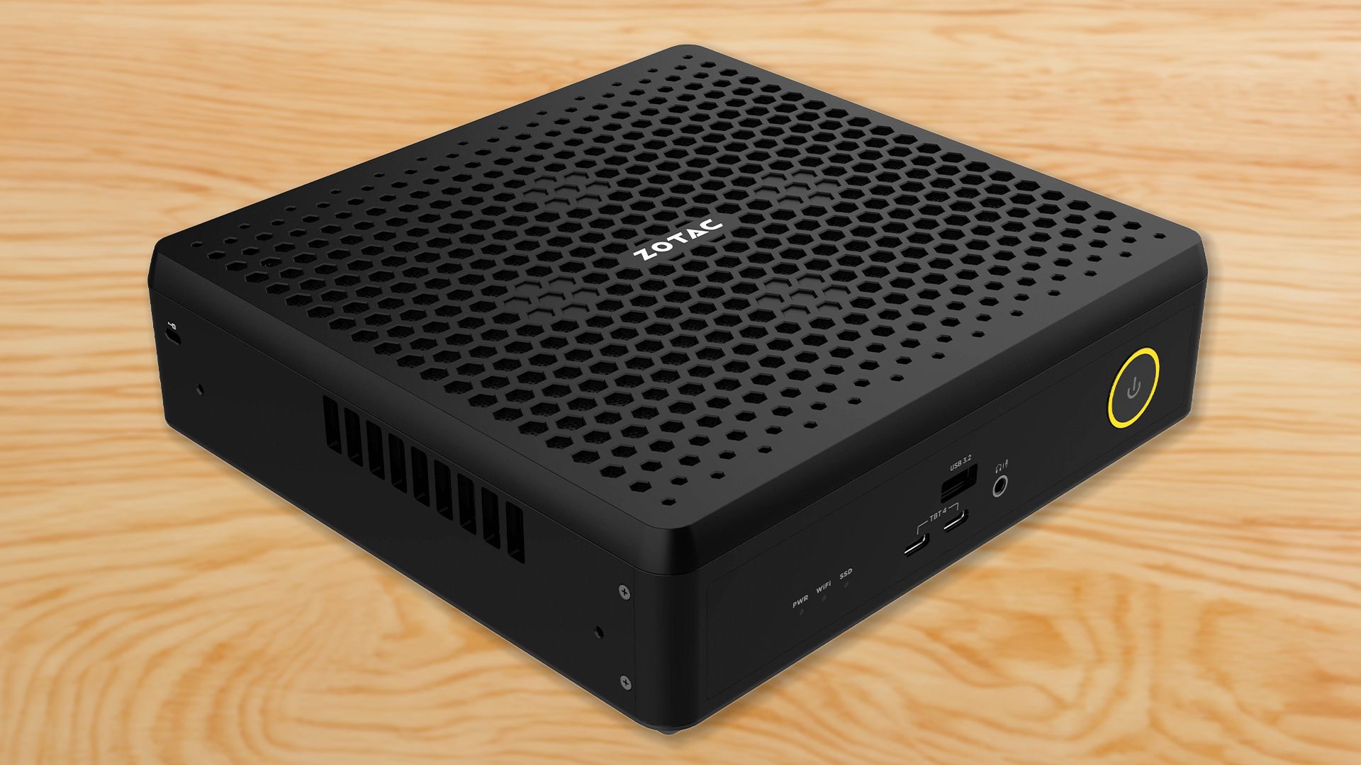 Illustration of the ZOTAC MAGNUS EN75060TC mini pc on a table.