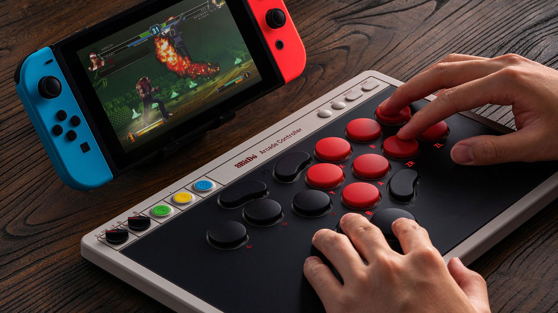 Someone playing on the Nintendo Switch with a 8BitDo Arcade Controller.