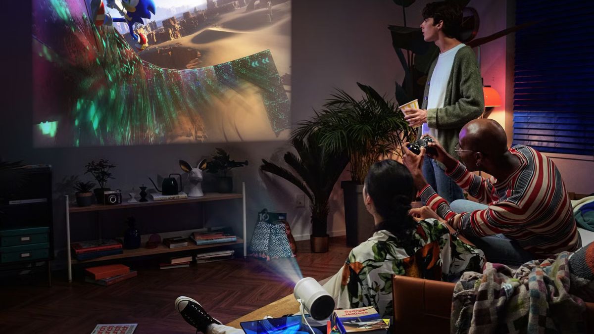 A family playing Sonic on a Samsung Freestyle 2 projector
