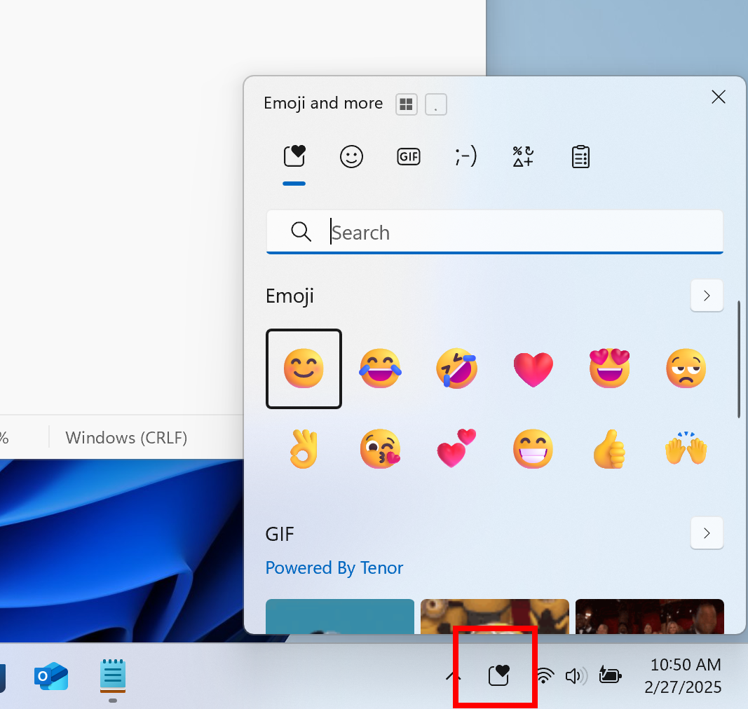 Windows 11 emoji panel in taskbar.