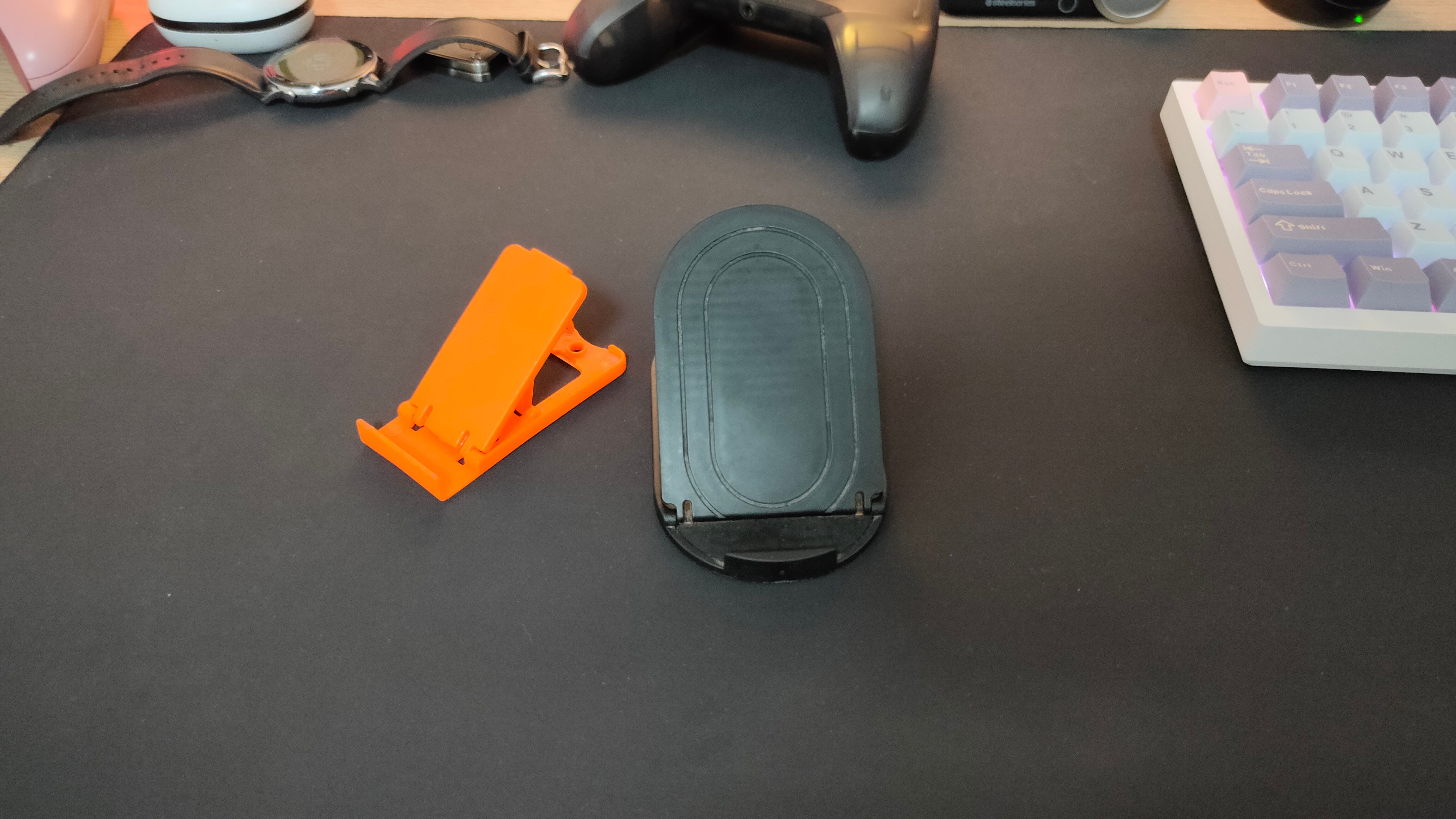 Two phone holders next to each other.