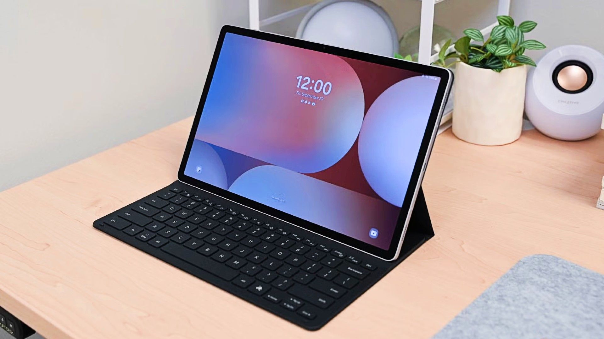 Lock screen of the Samsung Galaxy Tab S10+ while it sits on a table.