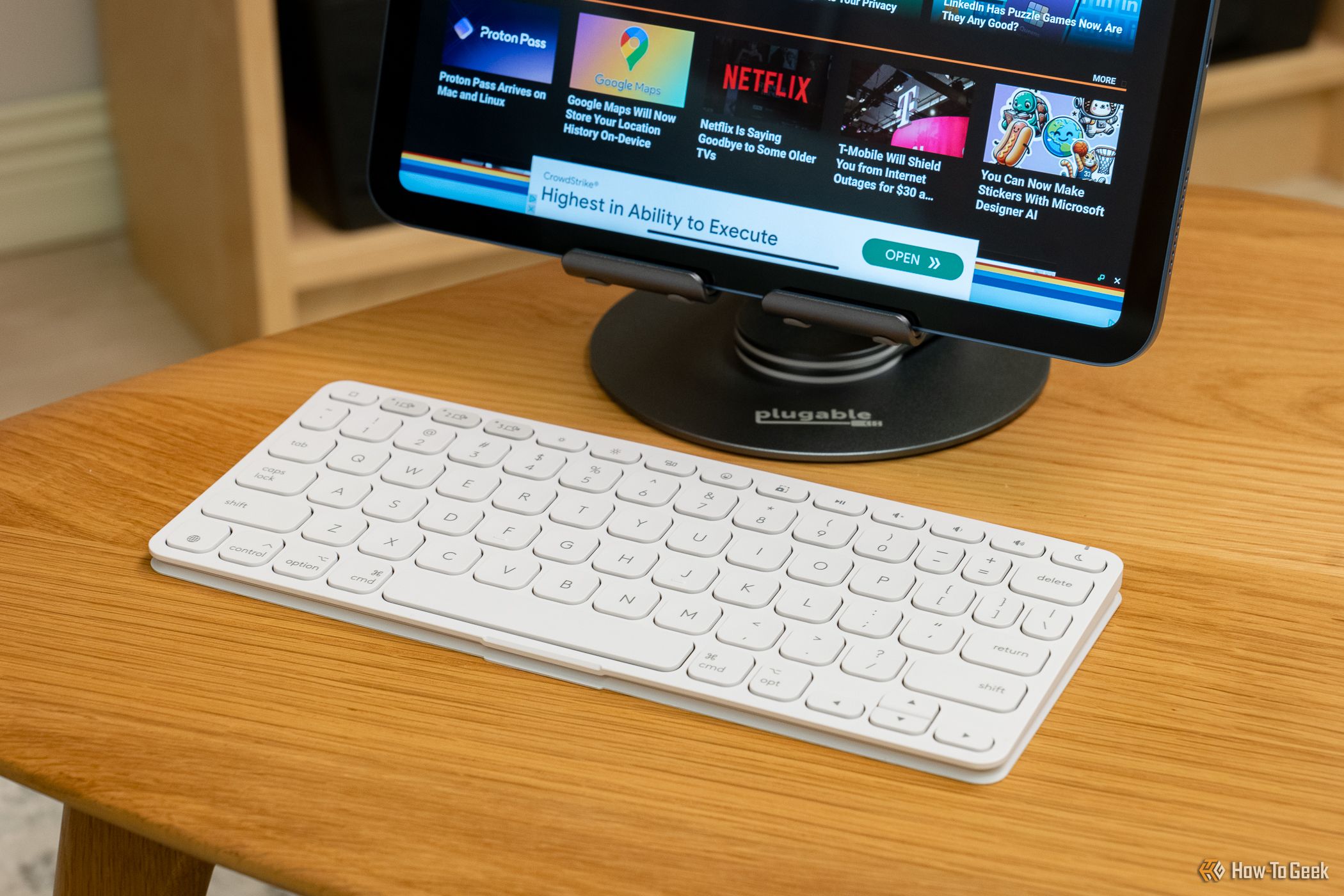 Logitech Keys-To-Go 2 on a desk next to an ipad