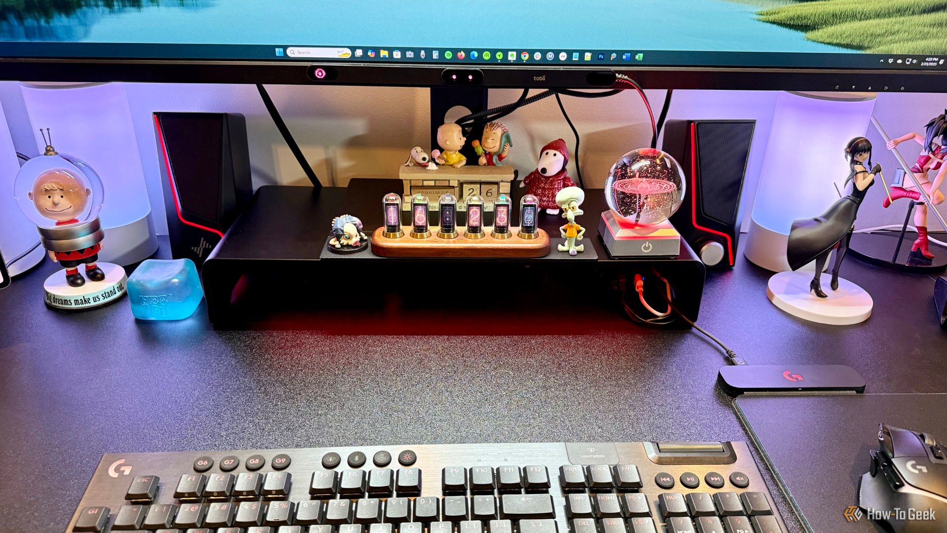 Razer Monitor Stand Chroma on a desktop with various accessories.