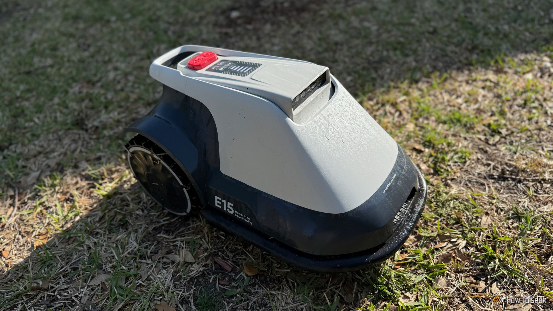 Eufy e15 robot mower on grass.