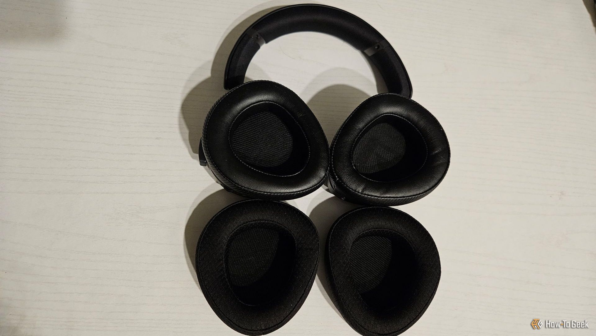 The two pairs of earmuffs for the ASUS ROG Delta II.