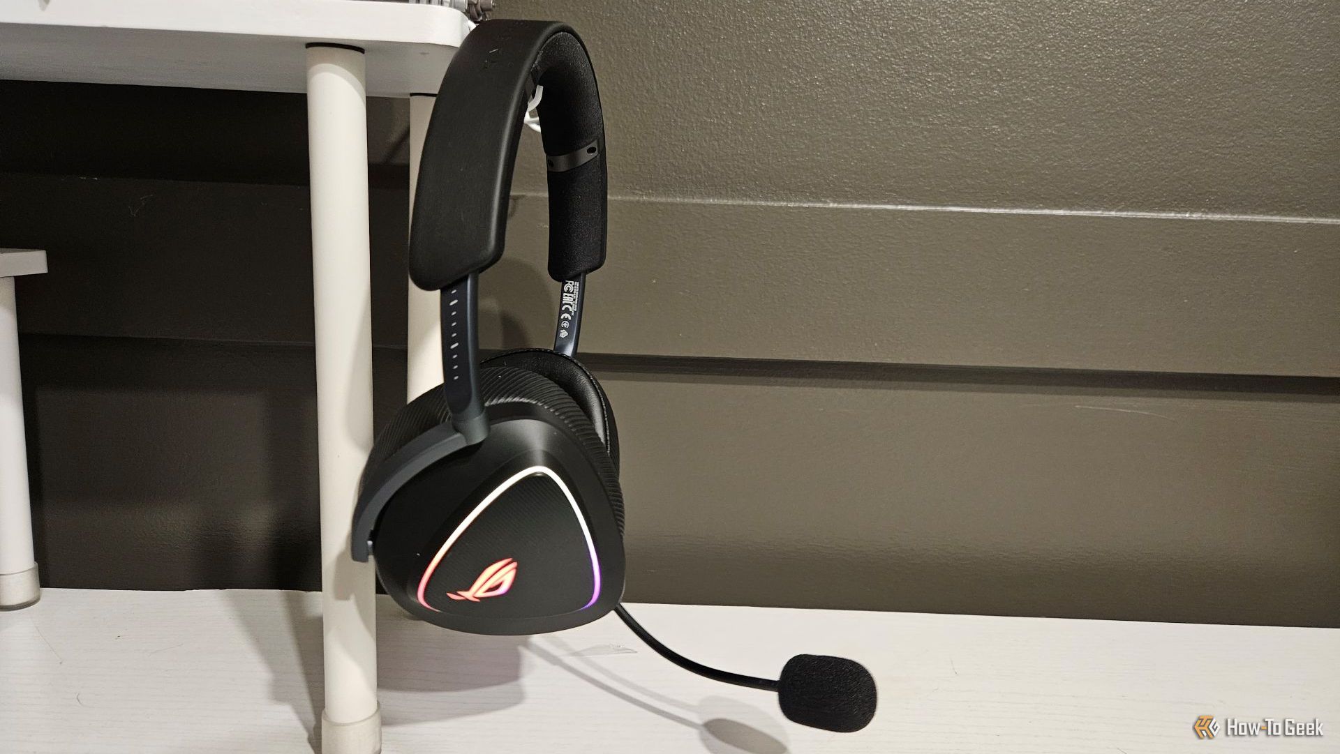The ASUS ROG Delta II hanging on a desk.