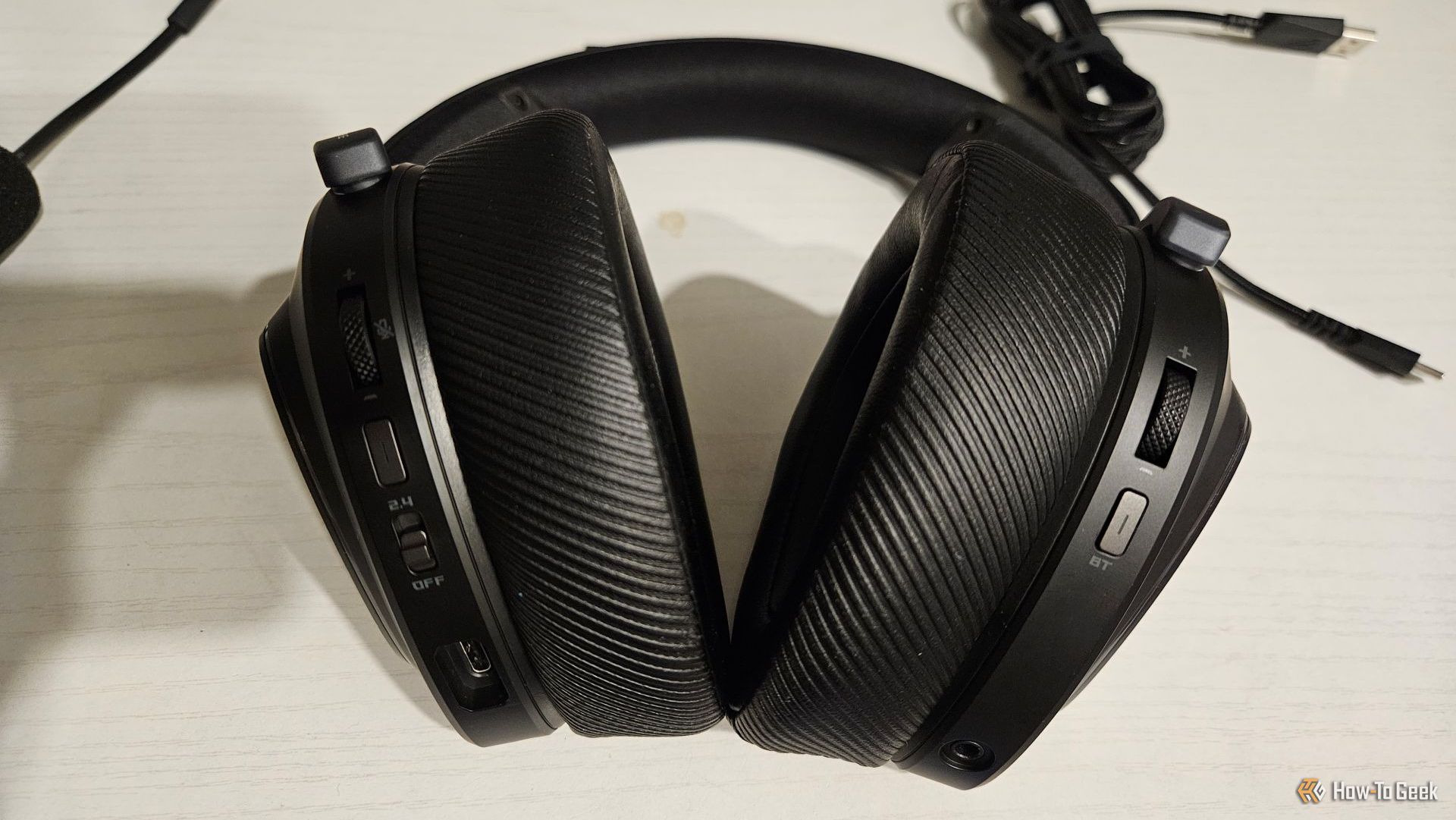 The Various ports and buttons on the back side of the ASUS ROG Delta II gaming headset.