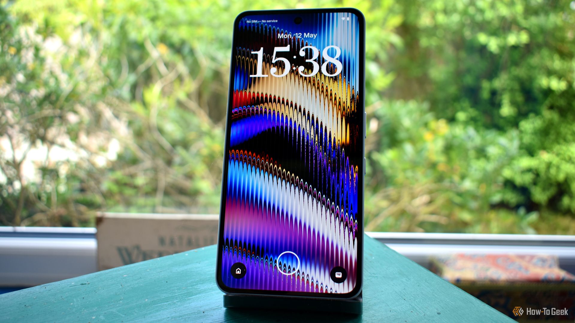 nothing phone 3a pro front view on stand.