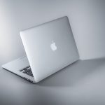 USB-C hub connected to MacBook Pro on a desk